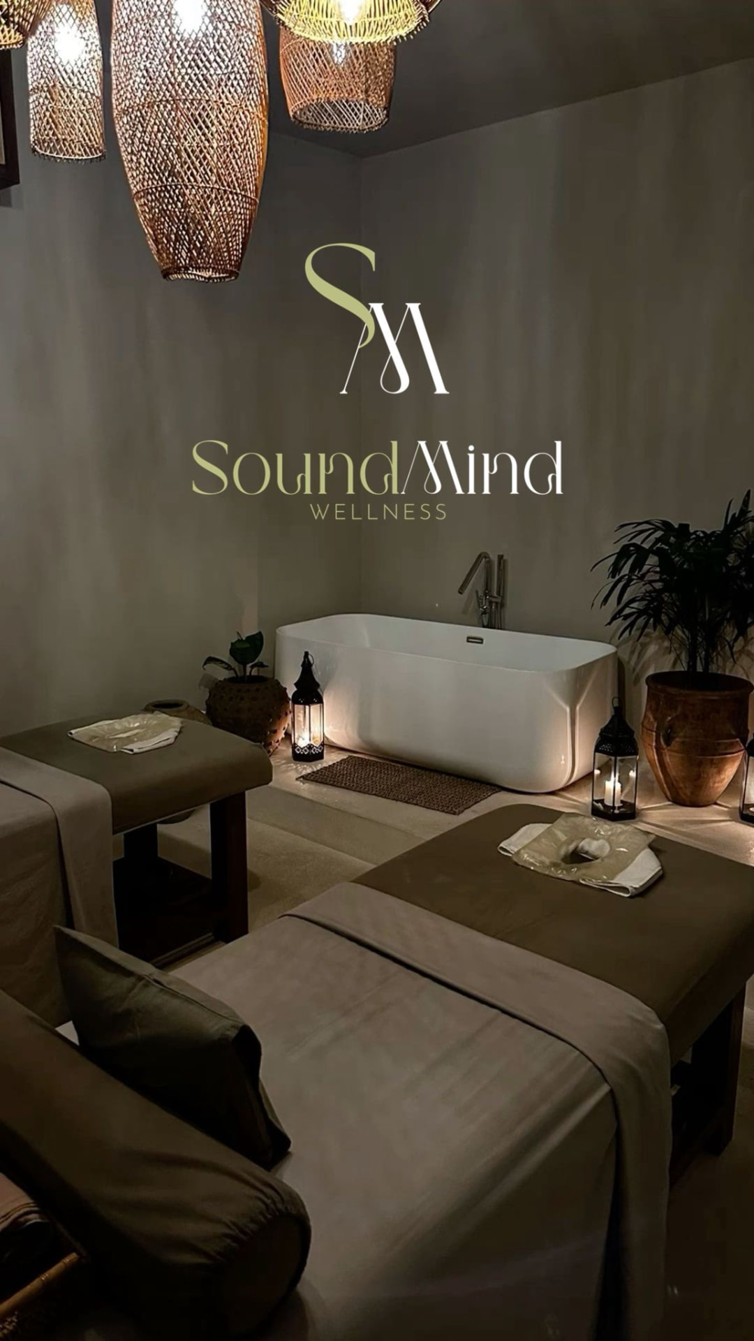 A candlelit Sound Mind Wellness treatment room